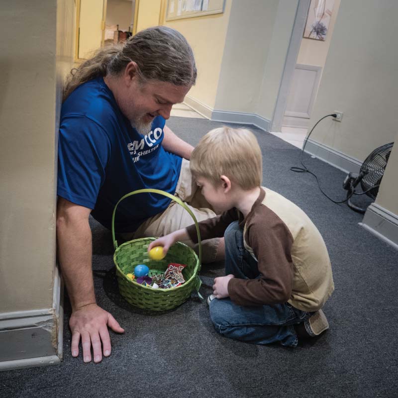 A father and son with an easter basket